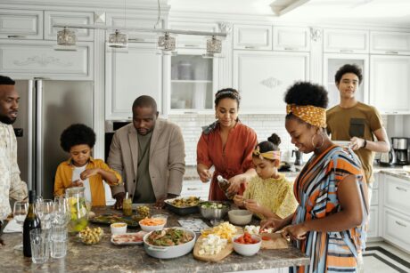 Mom meal prepping in the kitchen surrounded my loved ones