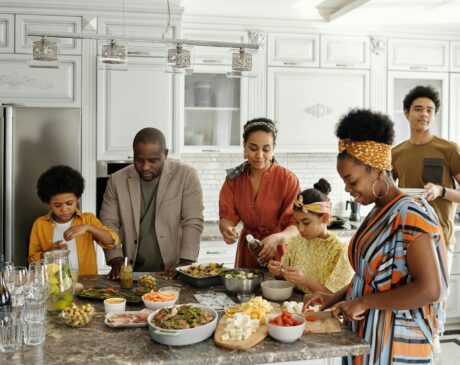 Mom meal prepping in the kitchen surrounded my loved ones